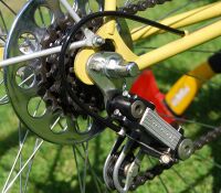 Zeitraum: Ende 80er Jahre Verwendung: Diamant-Rennräder und -Rennsporträder Material: Aluminium, Kunststoff Bemerkungen: letzte Ausführung; Kettenleitrollen mit Aussparungen