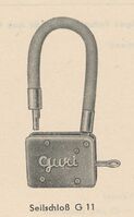 Seilschloss G 11 Zeitraum: bis mind. 1968 Verwendung: Zubehörteil Material: Stahl, Kunststoff Hersteller:Guri Prägung: Guri Bekannte Farben: Bemerkungen: