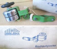 Radlaufglocke, Hersteller: LUMET, 50er Jahre, Material: Stahl (verchromt, lackiert), Gummi