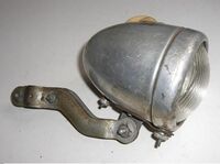 Scheinwerfer Typ MGK 310 Zeitraum: ca. 1955 bis 1958 Verwendung: Zubehör Material: Aluminium, Glas Bemerkungen: mit Fahr- und Bodenlicht