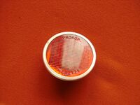Zeitraum: ?? Hersteller: Prokop Material: Glas, Aluminium Verwendung: serienmäßig an Straßenrennrädern Bemerkungen: Durchmesser ca. 29mm, Farben: rot (an Straßenrennrädern), weiß, orange, gelb, grün, blau